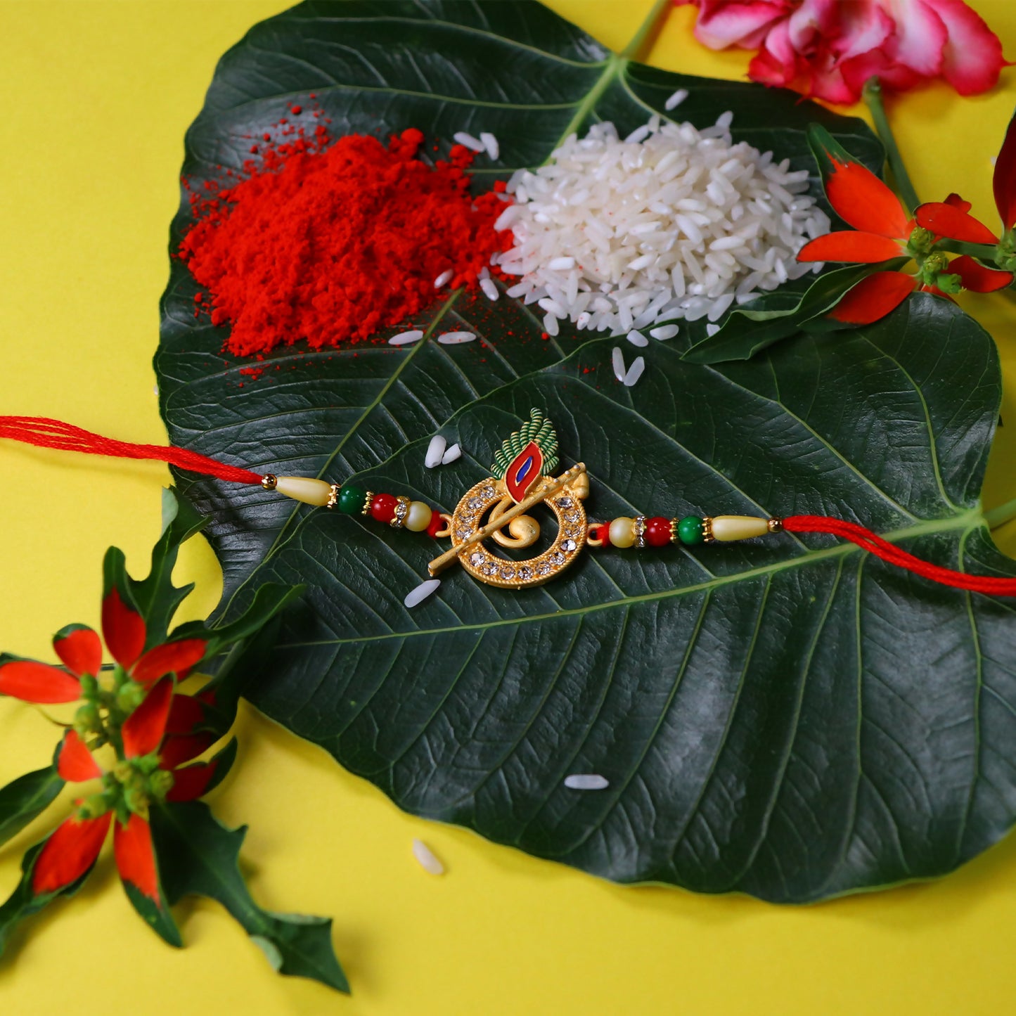 Krishna Flute Rakhi With Stone Studded Peacock Feather Design