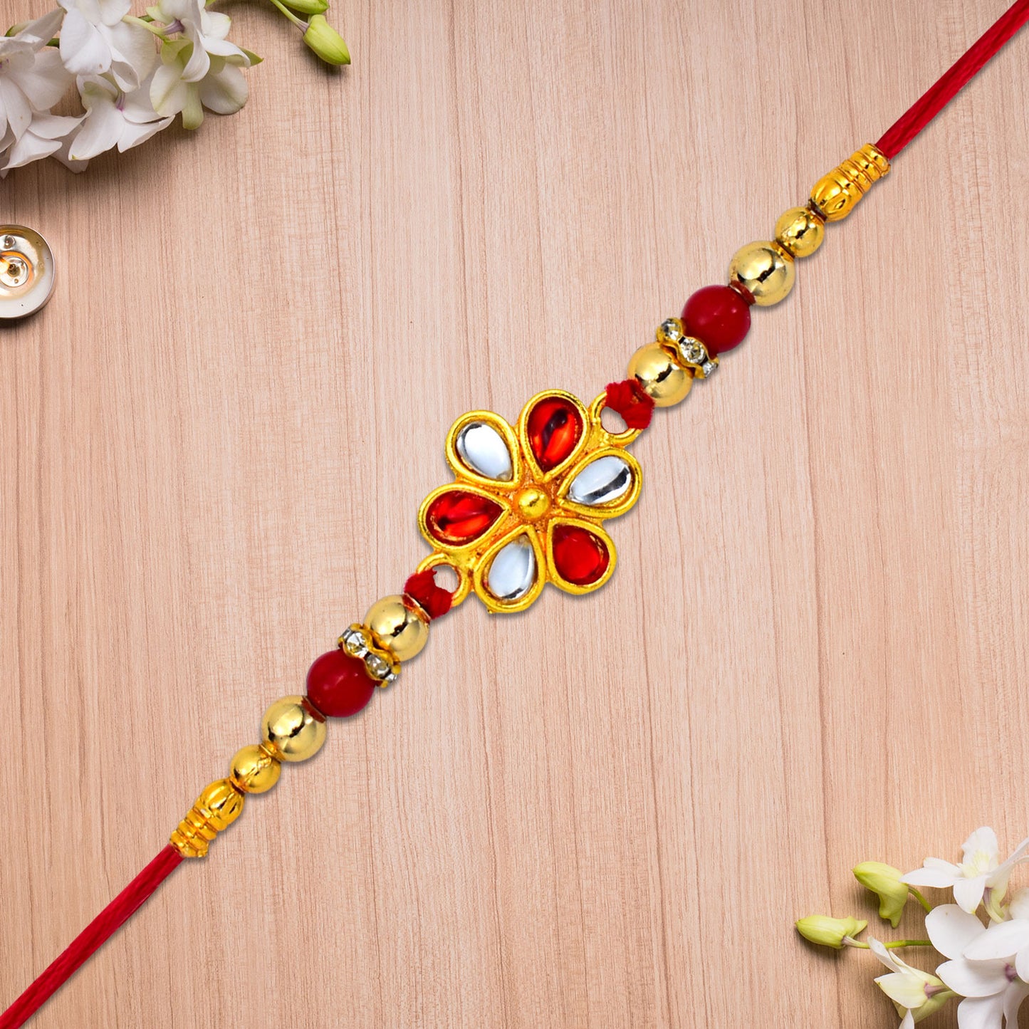 Elegant Red  White Beaded Rakhi With Teardrop Kundan Floral Centerpiece